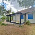 Avec toiture polycarbonate