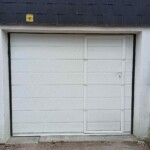 Porte électrique avec porte de service