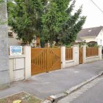 Portails et clôture assortis, motorisation électrique